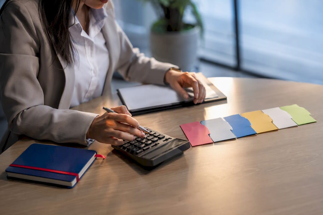 Migration adviser calculating application fees
