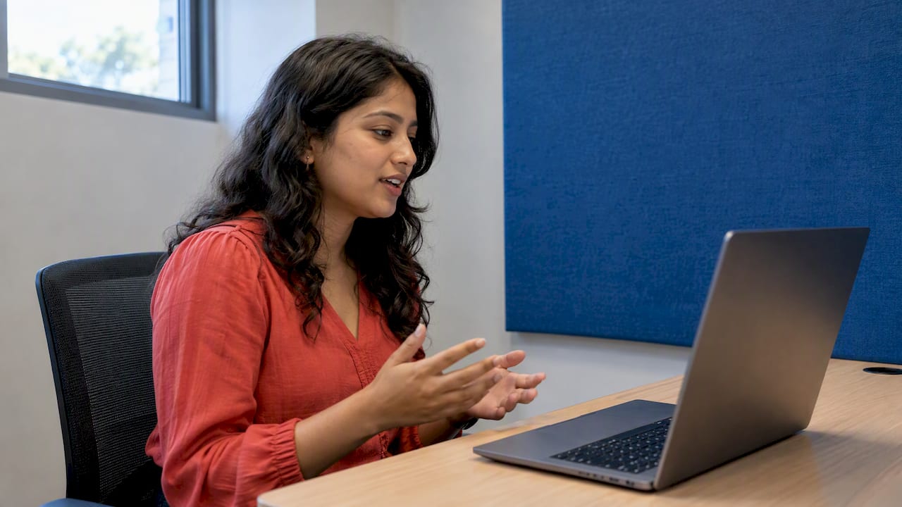 Student answering an online interview at university